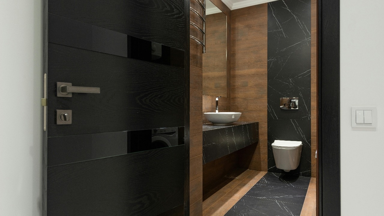 Woman Turns Workplace Toilet into Home