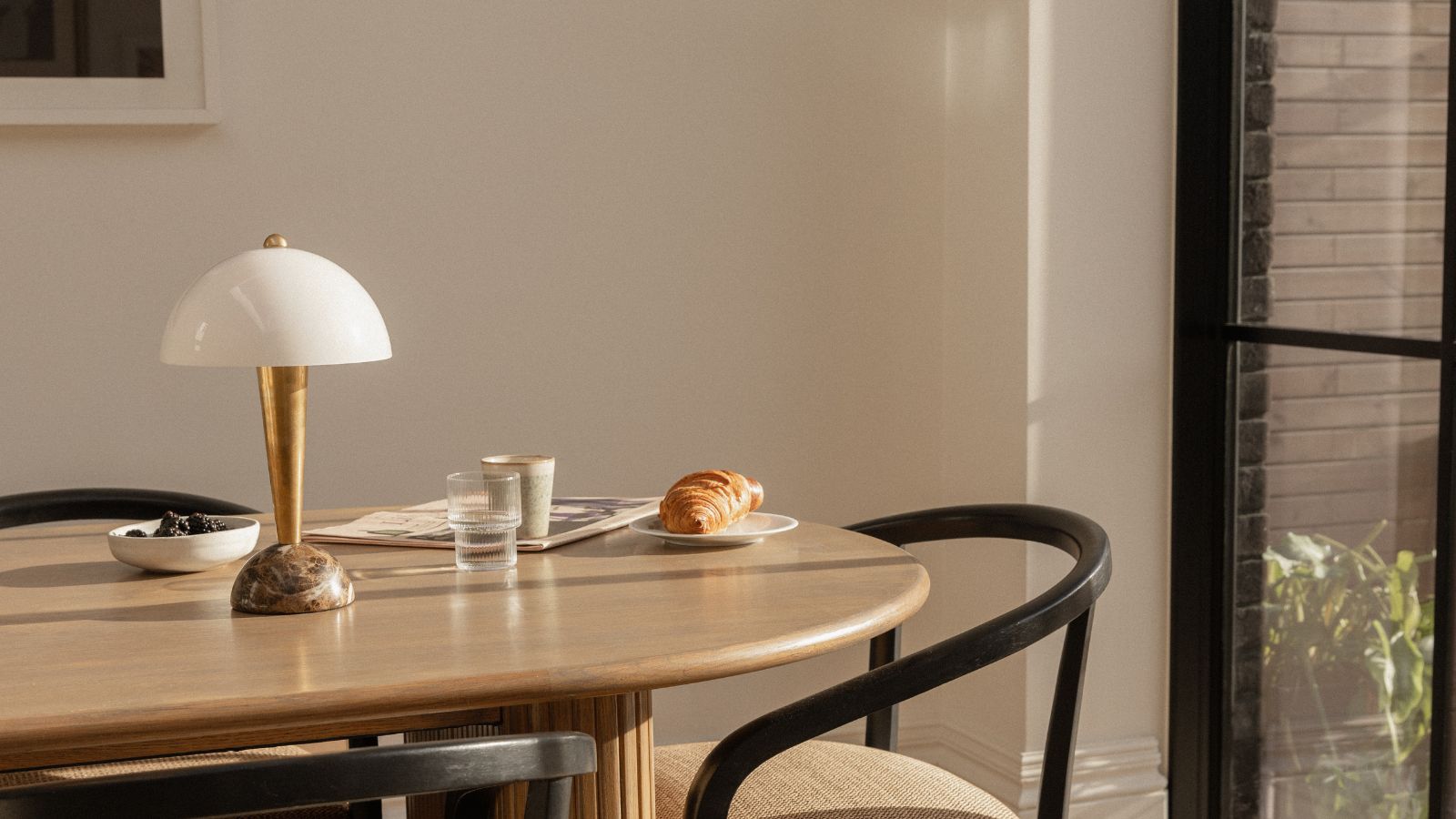 My kitchen table was an unsightly dumping ground &ndash; but this one designer tip to just buy a lamp changed it completely