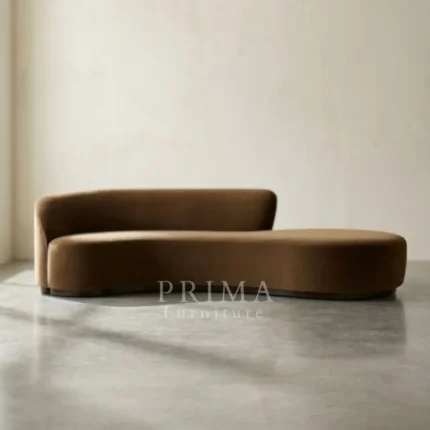 Michael Curved Serpentine Sofa in modern minimalist room