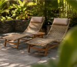 Twin Outdoor Lounge Chairs And Small Table In Courtyard Setting