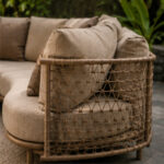 Woven Side Panel Detail On Curved Outdoor Sofa